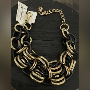 Disney parks gold tone and black link bracelet 7-10” NWT